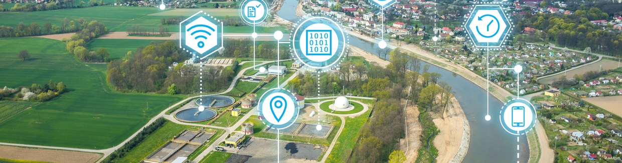 Cruscotto di Netilion Network Insights di fronte a un serbatoio dell'acqua