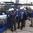 Metcore and Endress+Hauser gathered around a master meter proving skid